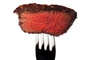 Alt="bite of steak on a fork"